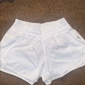 White lululemon tracker short with nude liner